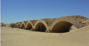 The arched railway bridge on the Wadi Halfa to Kerma railway a litte to the north-east of Delgo. Photo from Sudan Studies No. 53 p. 63. Credit: Derek Welsby.